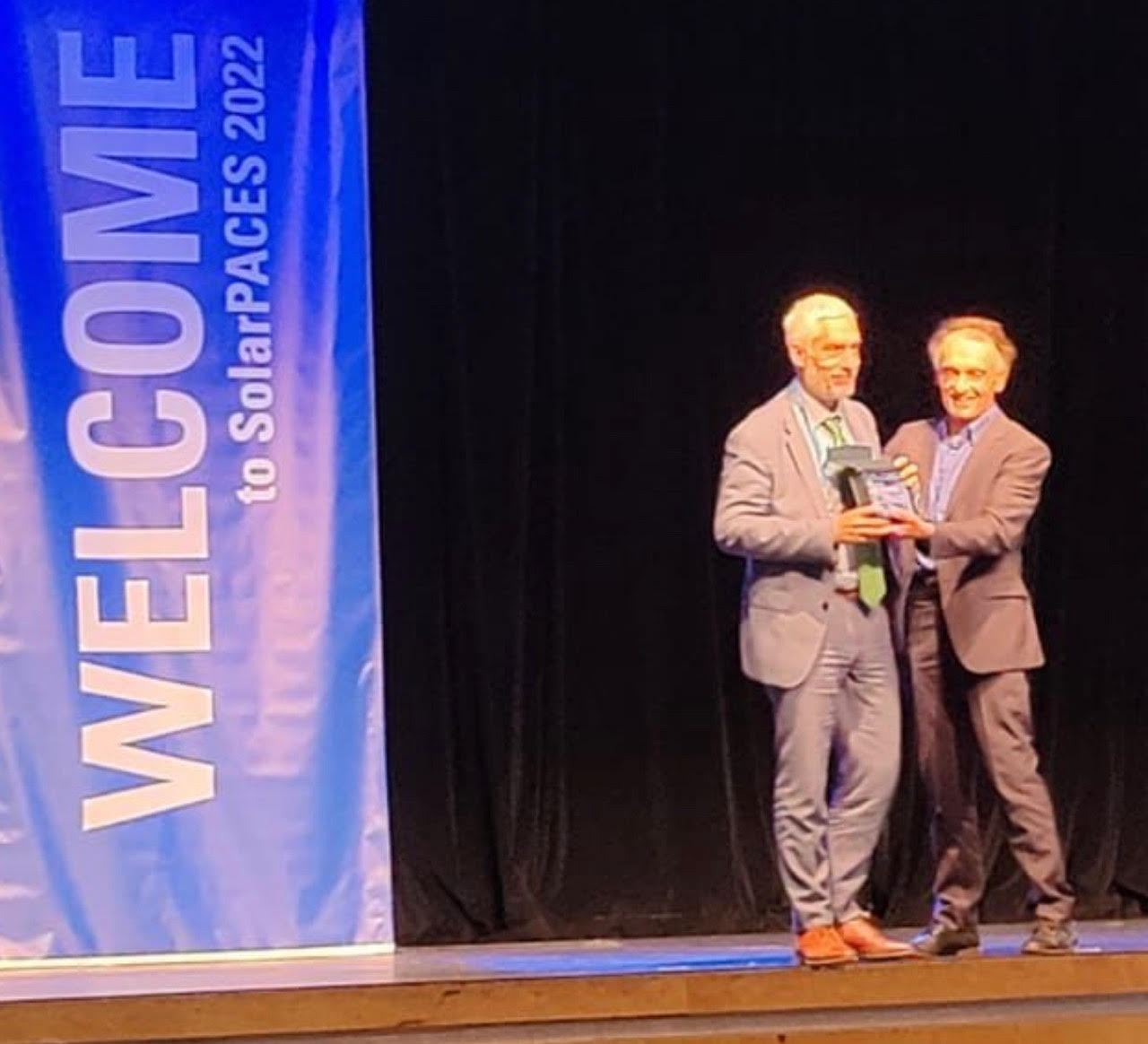 Xavier Lara receiving the IEA SolarPACES Lifetime Achievement Award, Albuquerque, New Mexico, 2022.